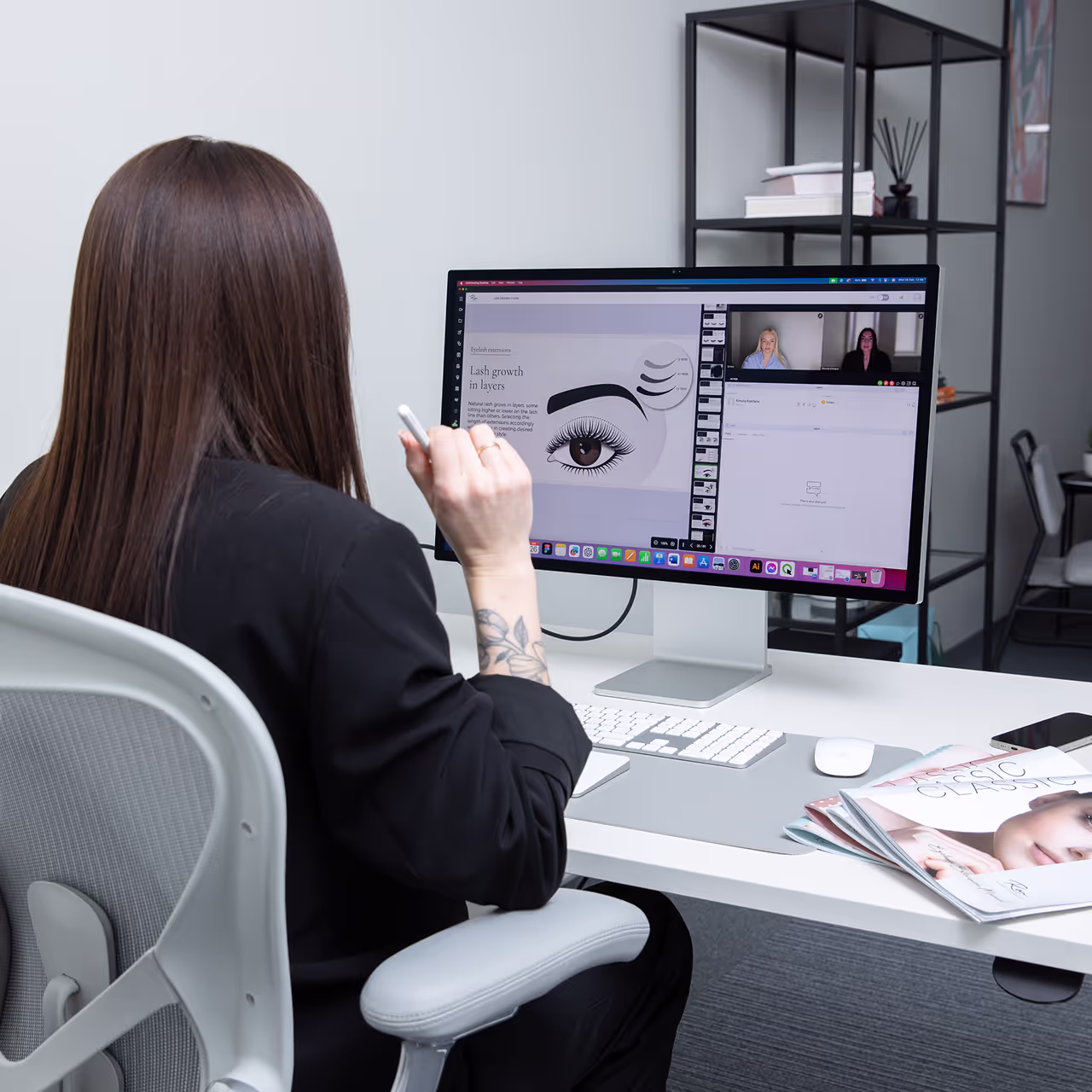 Lash training academy educator conducting an online training session about lash growth layers, using visual slides and live video conferencing with students.